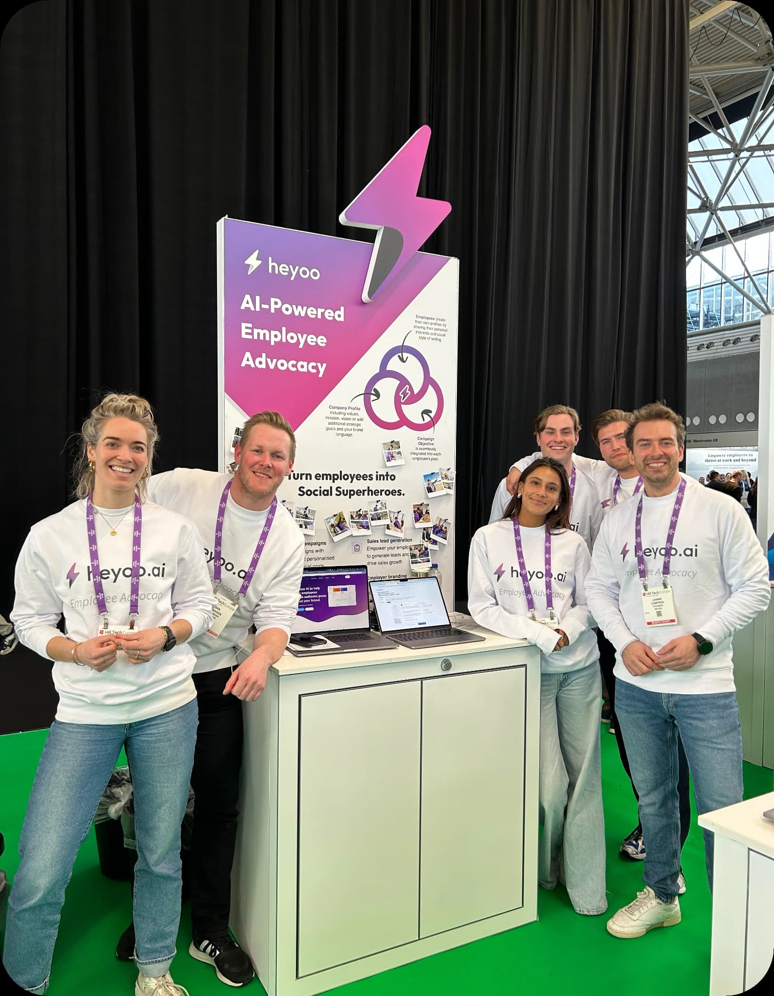 The Heyoo team at their booth at HR Tech Europe in Amsterdam