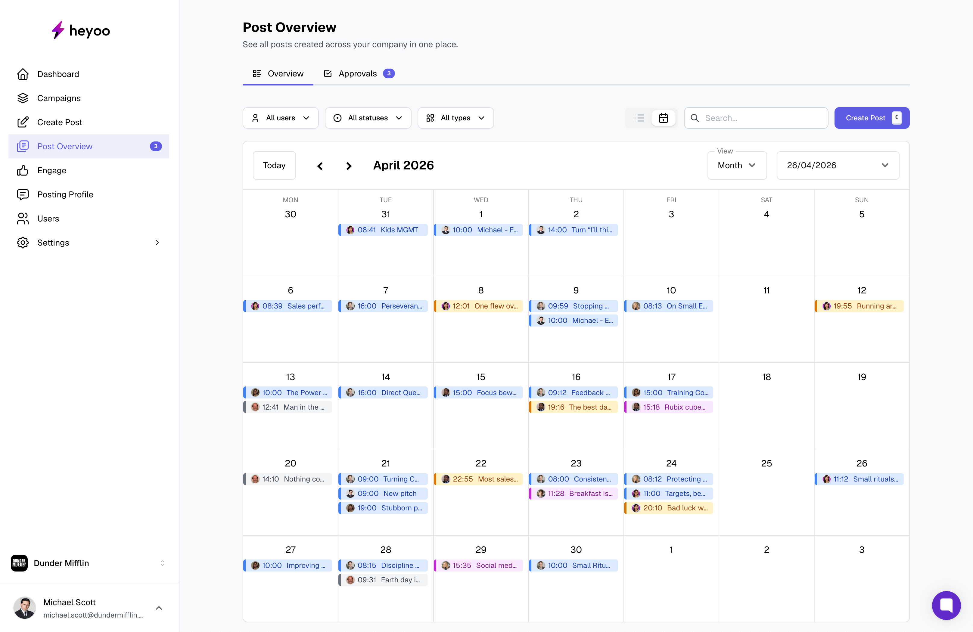 Heyoo content calendar in month view with posts across the company colour coded by status from draft to published