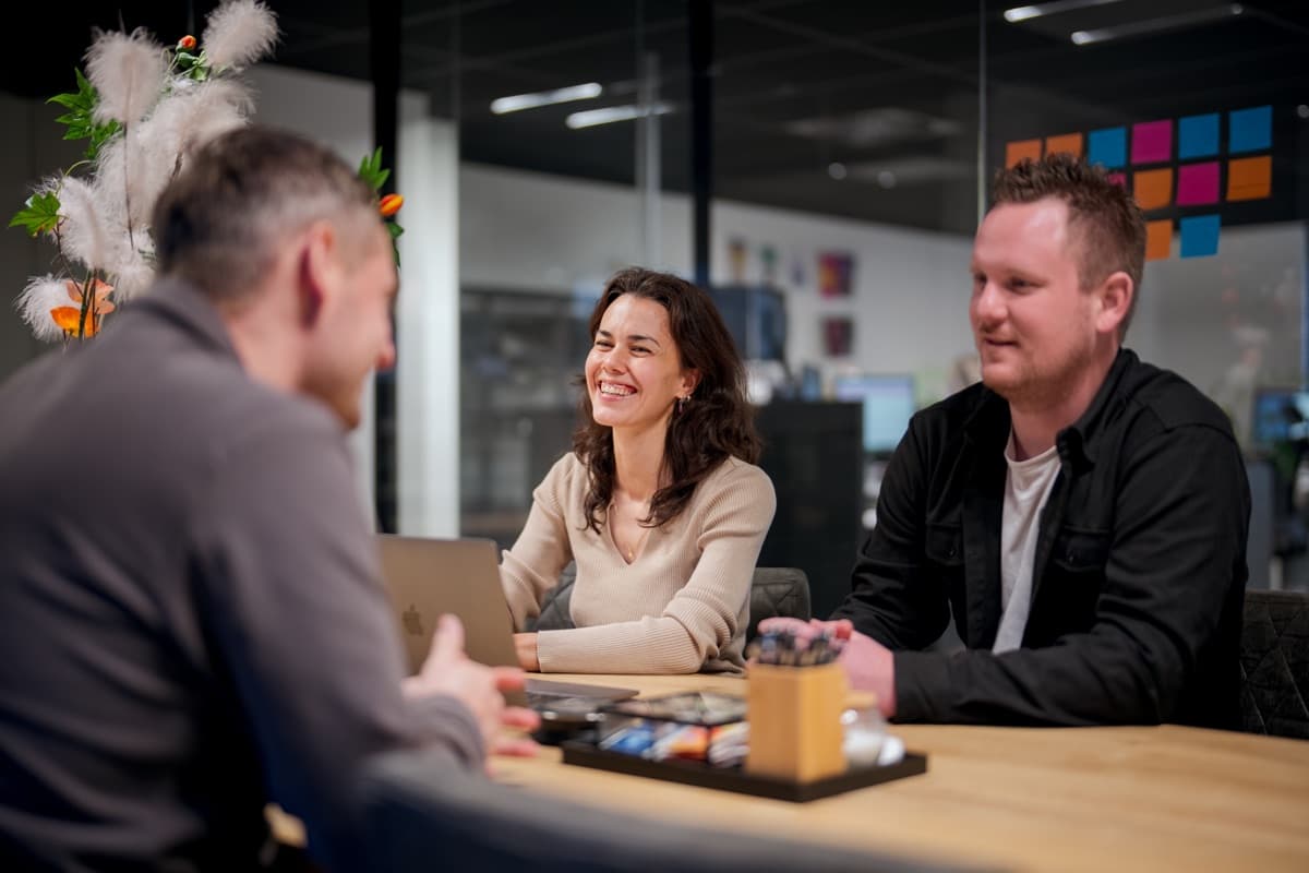 The Converseon team in a meeting at the agency’s office in Weesp